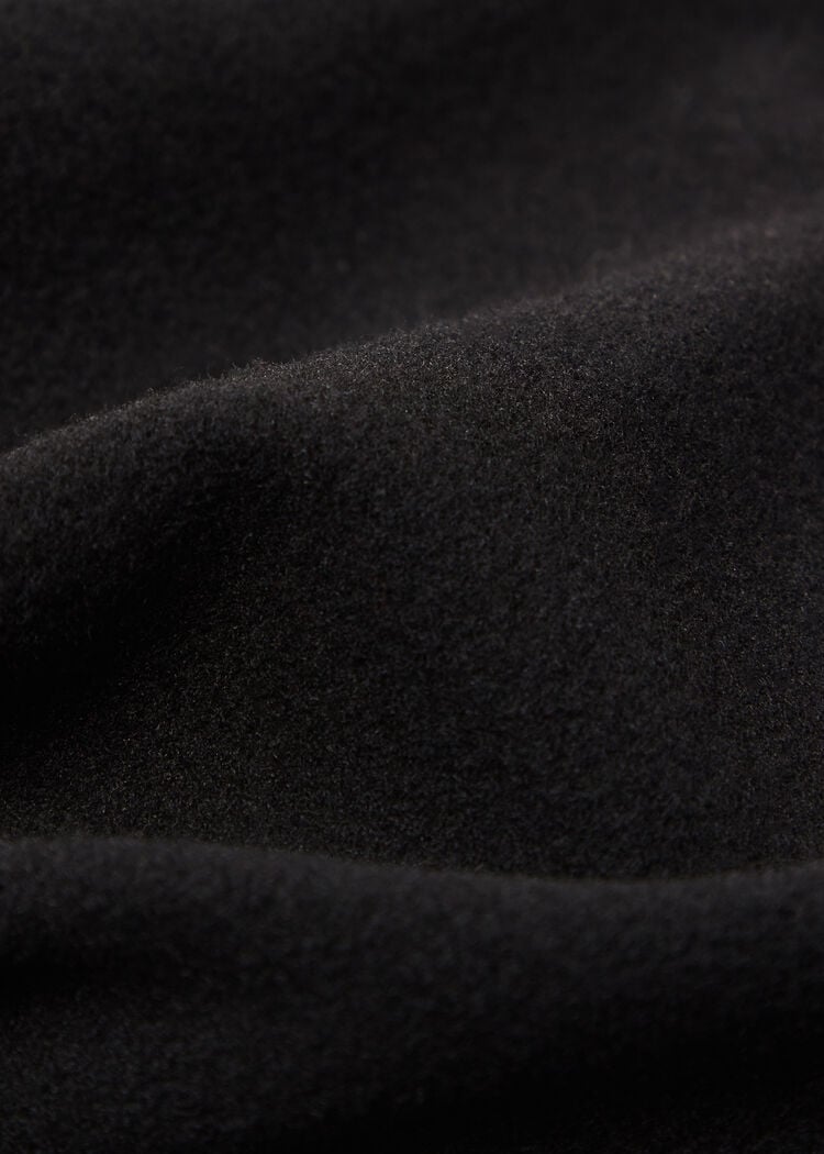 Thermal flared pants with coated effect