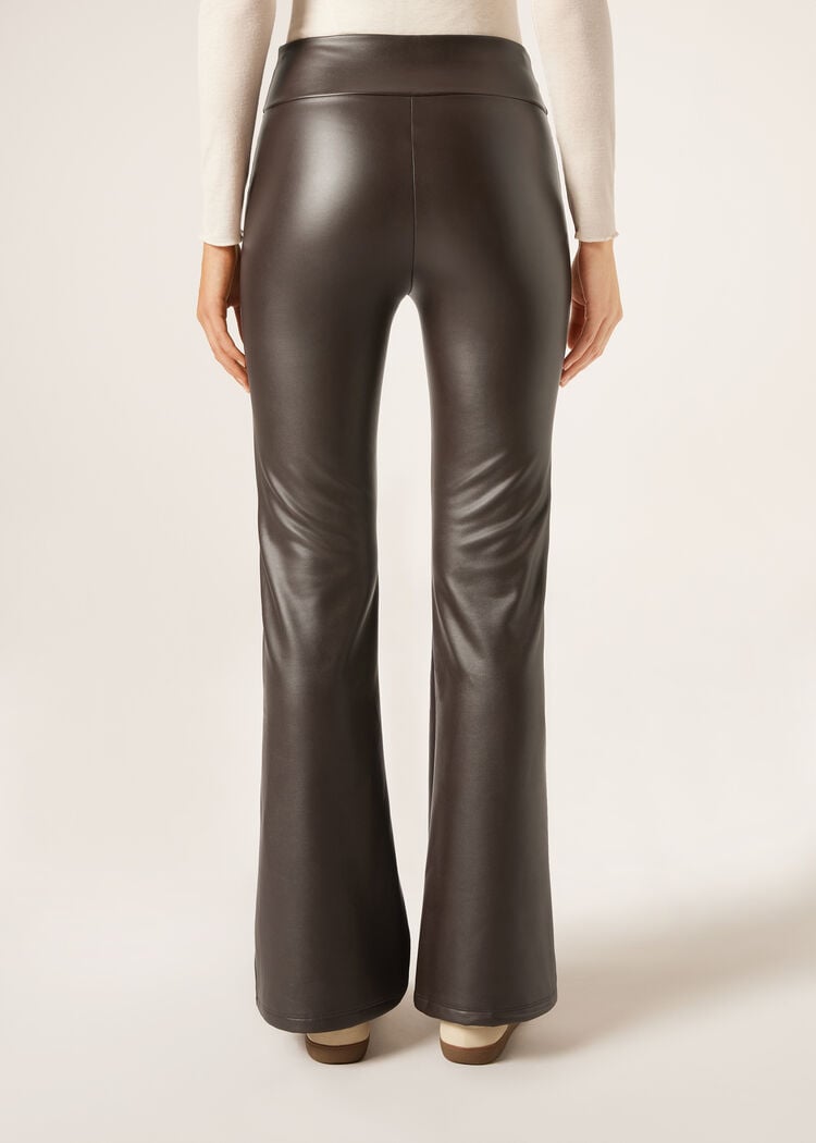 Thermal flared pants with coated effect